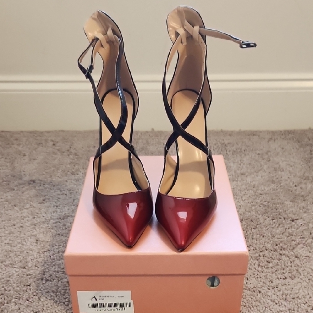 Red and Black High Heels with Intricate Straps and Pointed Toe